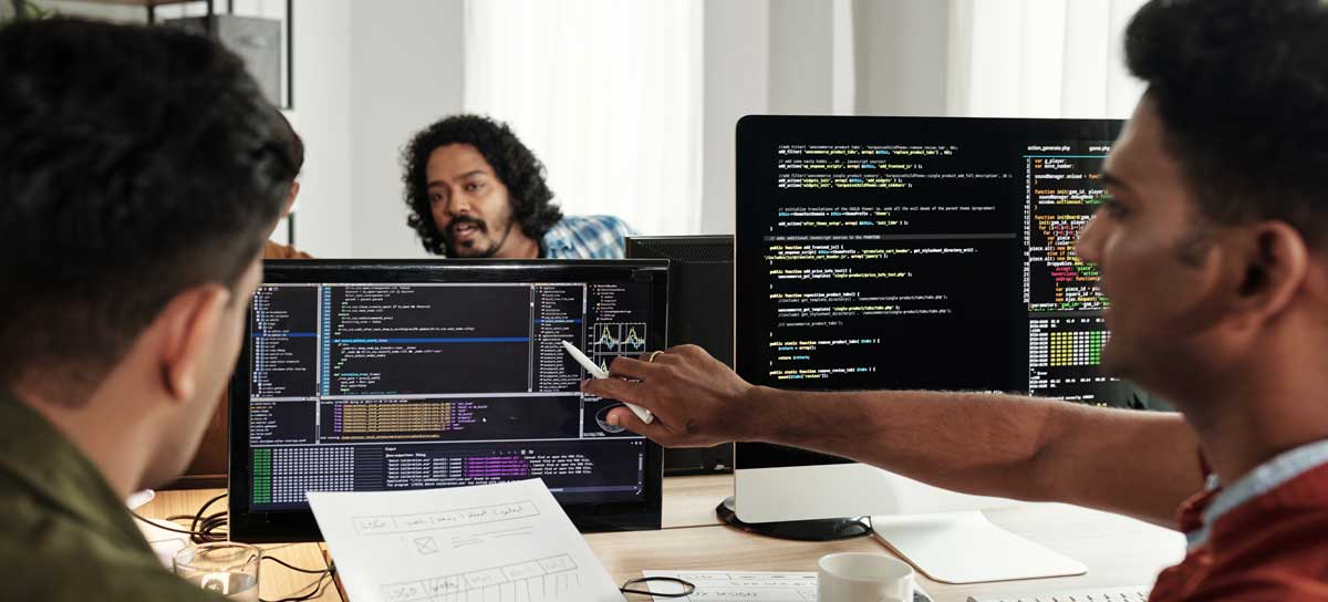 software engineers looking at a screen image